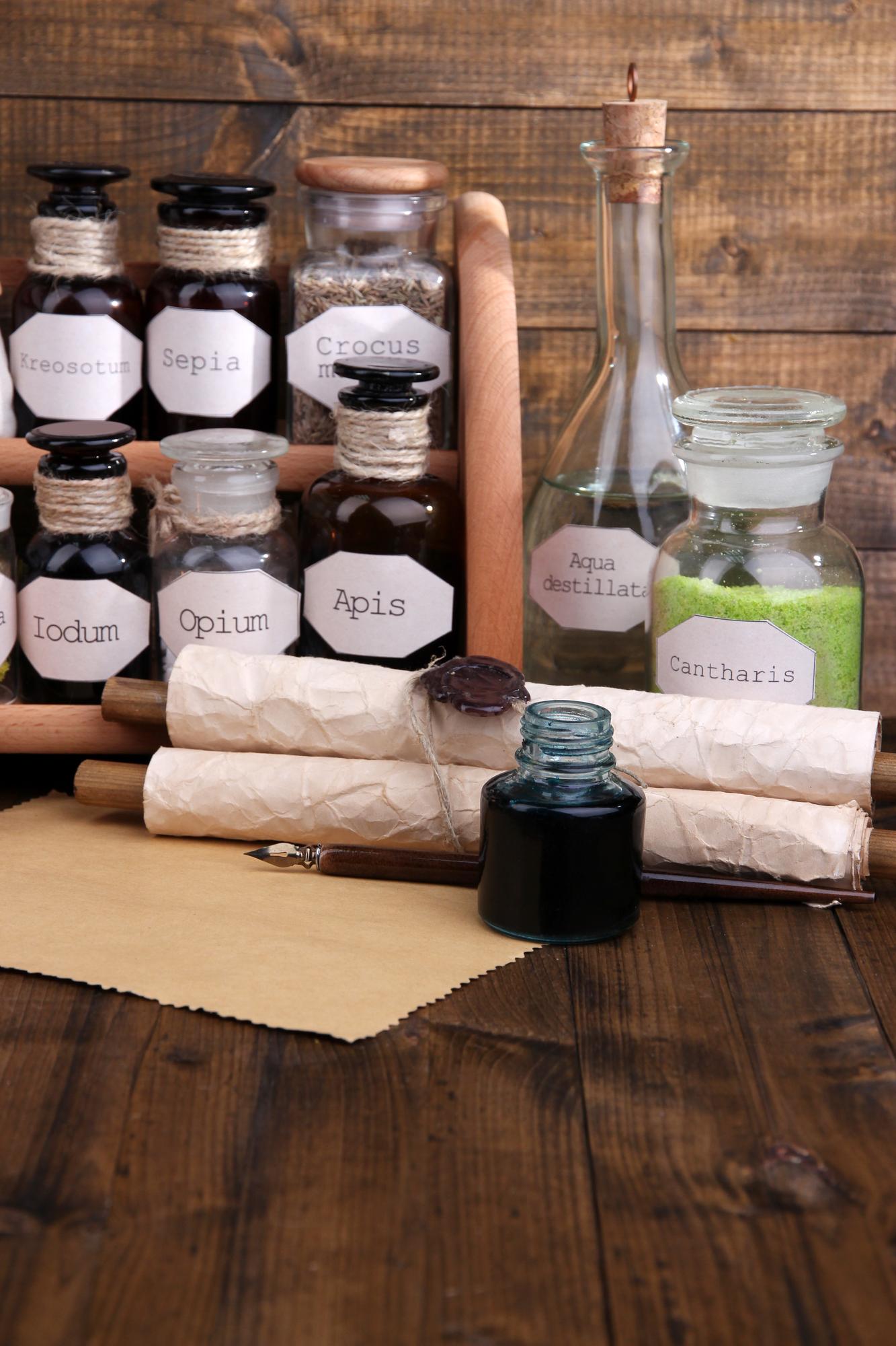 three packed kits on a wooden bench with labels